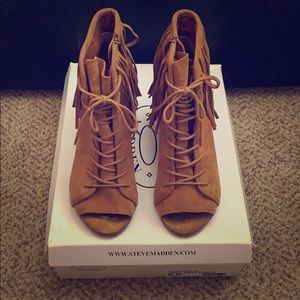 Chestnut suede open toe boots.